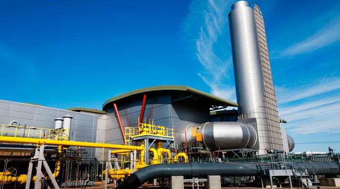Langage Energy Centre, Plymouth, Devon — Completed energy centre showing process plant, pipework and exhaust stack