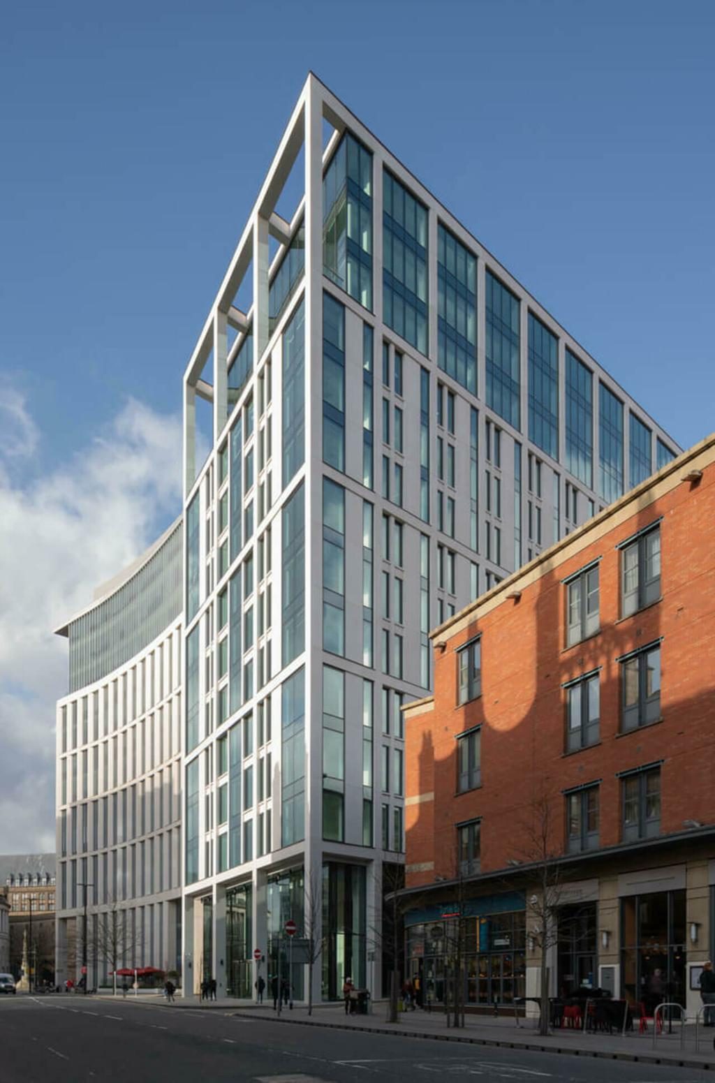 Landmark, St Peter's Square, Manchester — Completed elevation showing the curved facade and roof frame