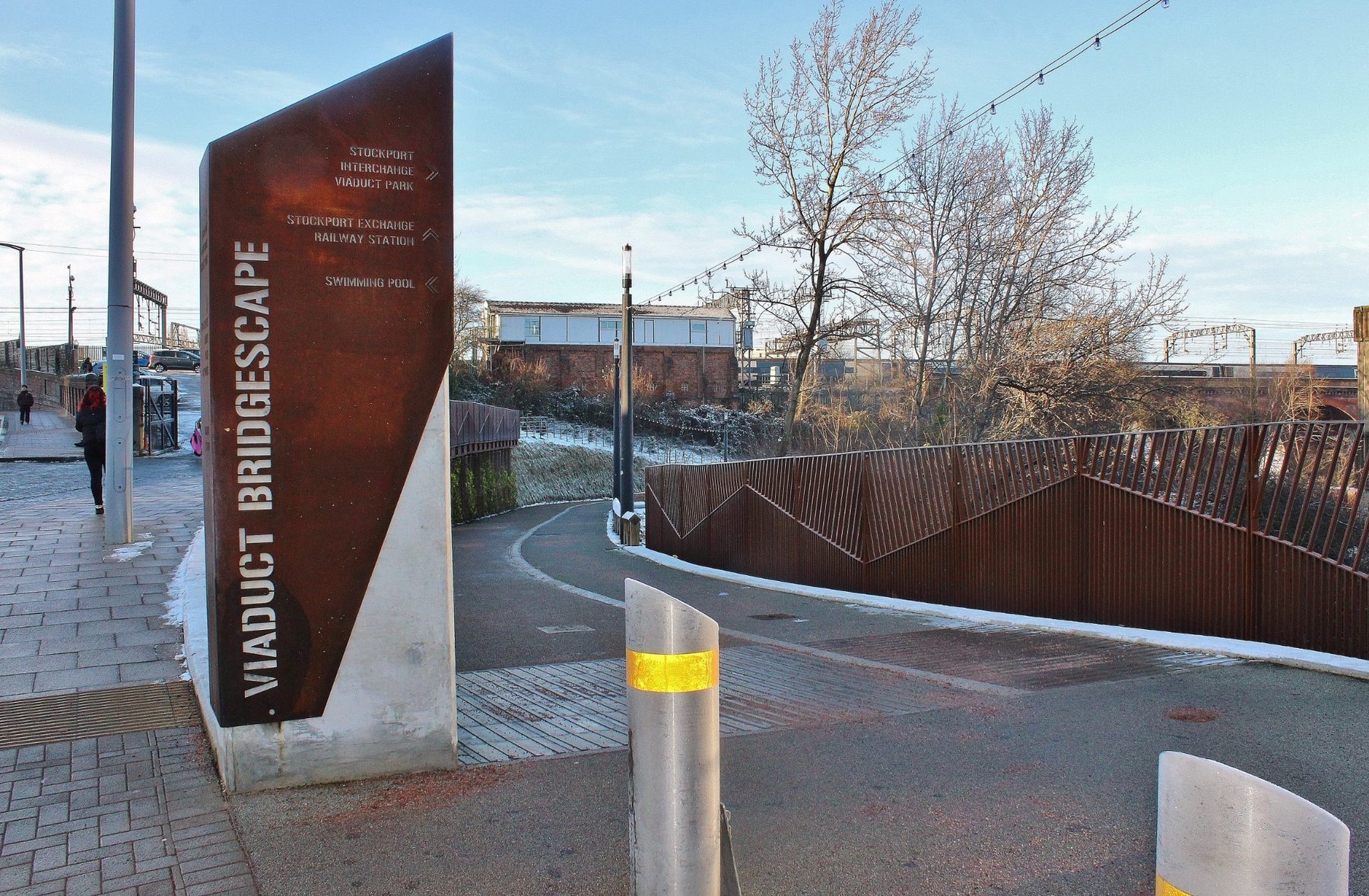 Stockport Interchange Bridgescape, Stockport, Greater Manchester — Completed bridgescape approach and signage beside the viaduct